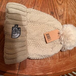 The North Face Cream Knit Beanie with Pom-Pom